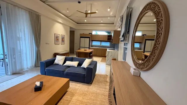 The living room, looking towards the kitchen