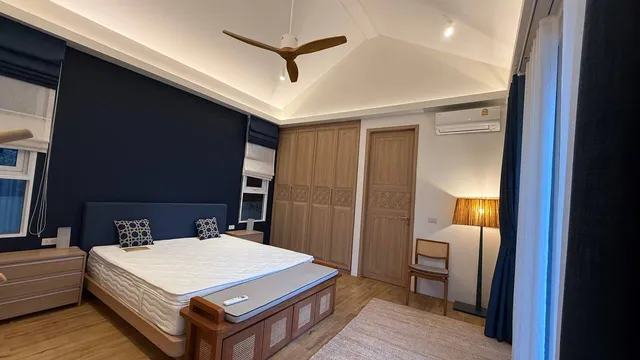 The master bedroom: wardrobes and the door to the terrace